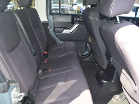 Used 2014 Jeep Wrangler Unlimited Rubicon w/ Dual Top Group AWD/4WD image 25