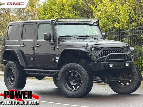 Used 2013 Jeep Wrangler Unlimited Sport image 1