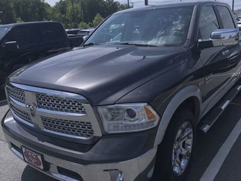 Used 2014 RAM 1500 Laramie w/ Convenience Group AWD/4WD image 1