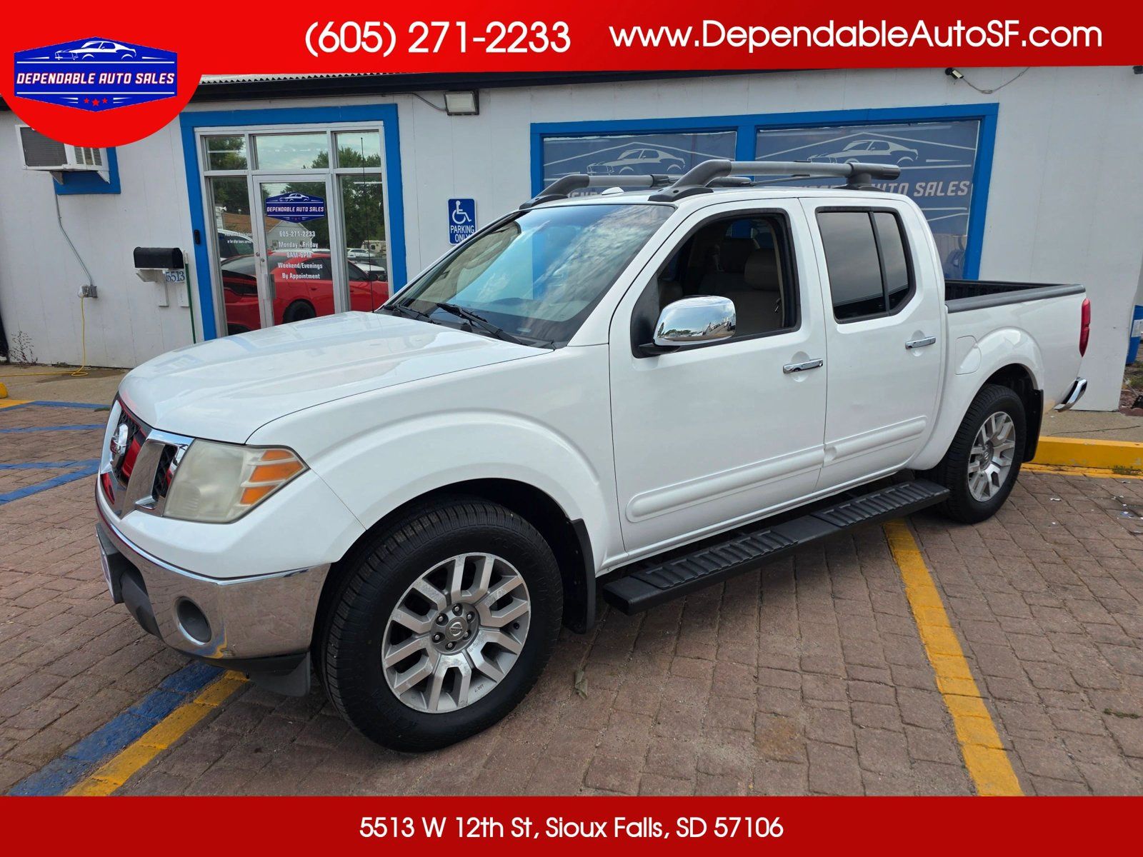 Used 2009 Nissan Frontier LE w/ LE Value Truck Pkg AWD/4WD image 1