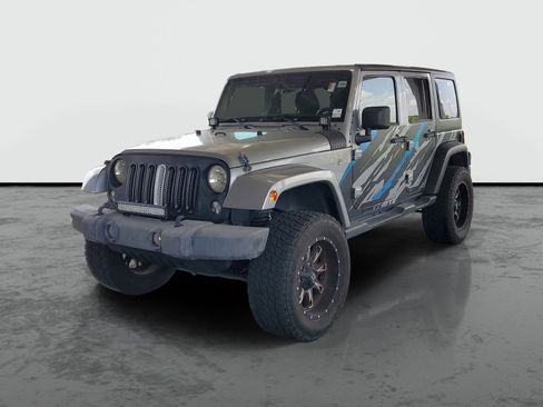 Used 2014 Jeep Wrangler Unlimited Sahara w/ Dual Top Group AWD/4WD image 4