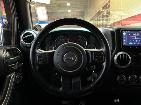 Used 2013 Jeep Wrangler Unlimited Sahara AWD/4WD image 33