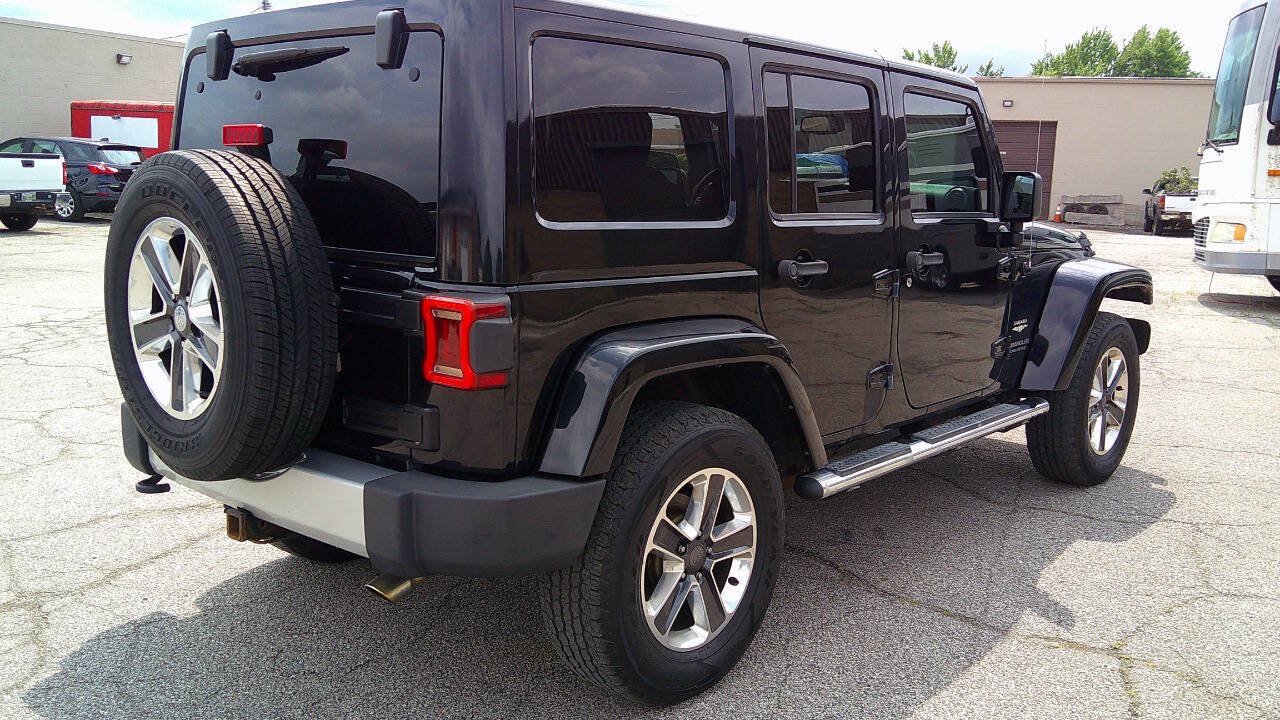 Used 2014 Jeep Wrangler Unlimited Sahara w/ Dual Top Group AWD/4WD image 5