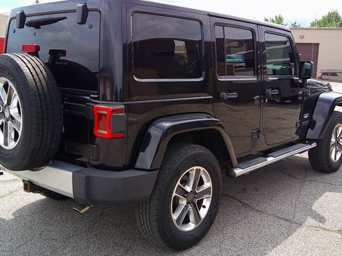 Used 2014 Jeep Wrangler Unlimited Sahara w/ Dual Top Group AWD/4WD image 5