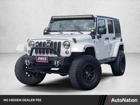 Used 2015 Jeep Wrangler Unlimited Sahara w/ Max Tow Package AWD/4WD image 1
