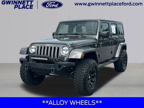 Used 2016 Jeep Wrangler Unlimited Sahara AWD/4WD image 1