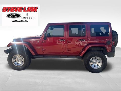 Used 2013 Jeep Wrangler Unlimited Sahara w/ Dual Top Group AWD/4WD image 1