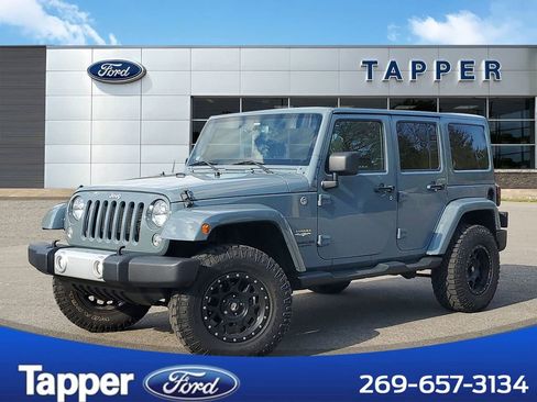 Used 2014 Jeep Wrangler Unlimited Sahara w/ Connectivity Group AWD/4WD image 1