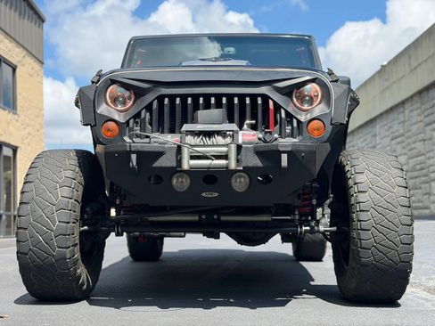 Used 2013 Jeep Wrangler Unlimited Sahara w/ Mopar Chrome Edition Group AWD/4WD image 33