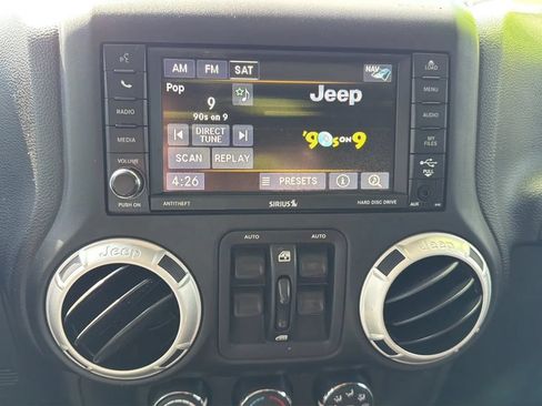 Used 2016 Jeep Wrangler Unlimited Sahara w/ Dual Top Group AWD/4WD image 14