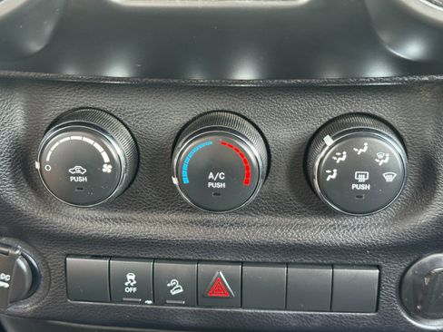 Used 2013 Jeep Wrangler Unlimited Sport w/ Mopar Black Appearance Group image 23