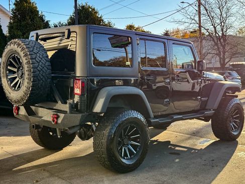 Used 2013 Jeep Wrangler Unlimited Rubicon w/ Dual Top Group image 3