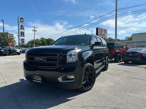 Used 2019 GMC Yukon XL SLT w/ Graphite Performance Edition AWD/4WD image 1
