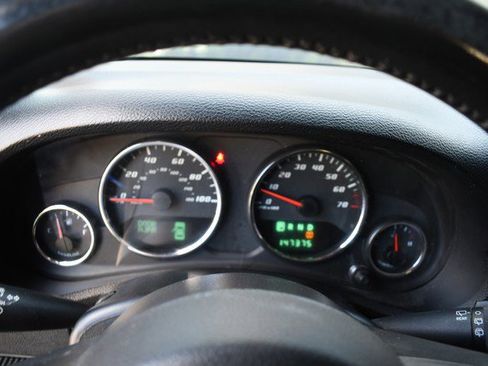 Used 2012 Jeep Wrangler Unlimited Sahara w/ Dual Top Group AWD/4WD image 31