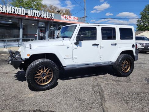 Used 2012 Jeep Wrangler Unlimited Sahara w/ Trailer Tow Group AWD/4WD image 7