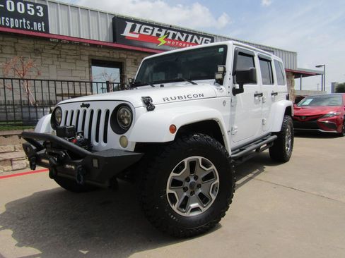 Used 2014 Jeep Wrangler Unlimited Rubicon w/ Connectivity Group AWD/4WD image 1
