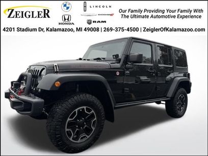 Used 2014 Jeep Wrangler Unlimited Rubicon w/ Dual Top Group
