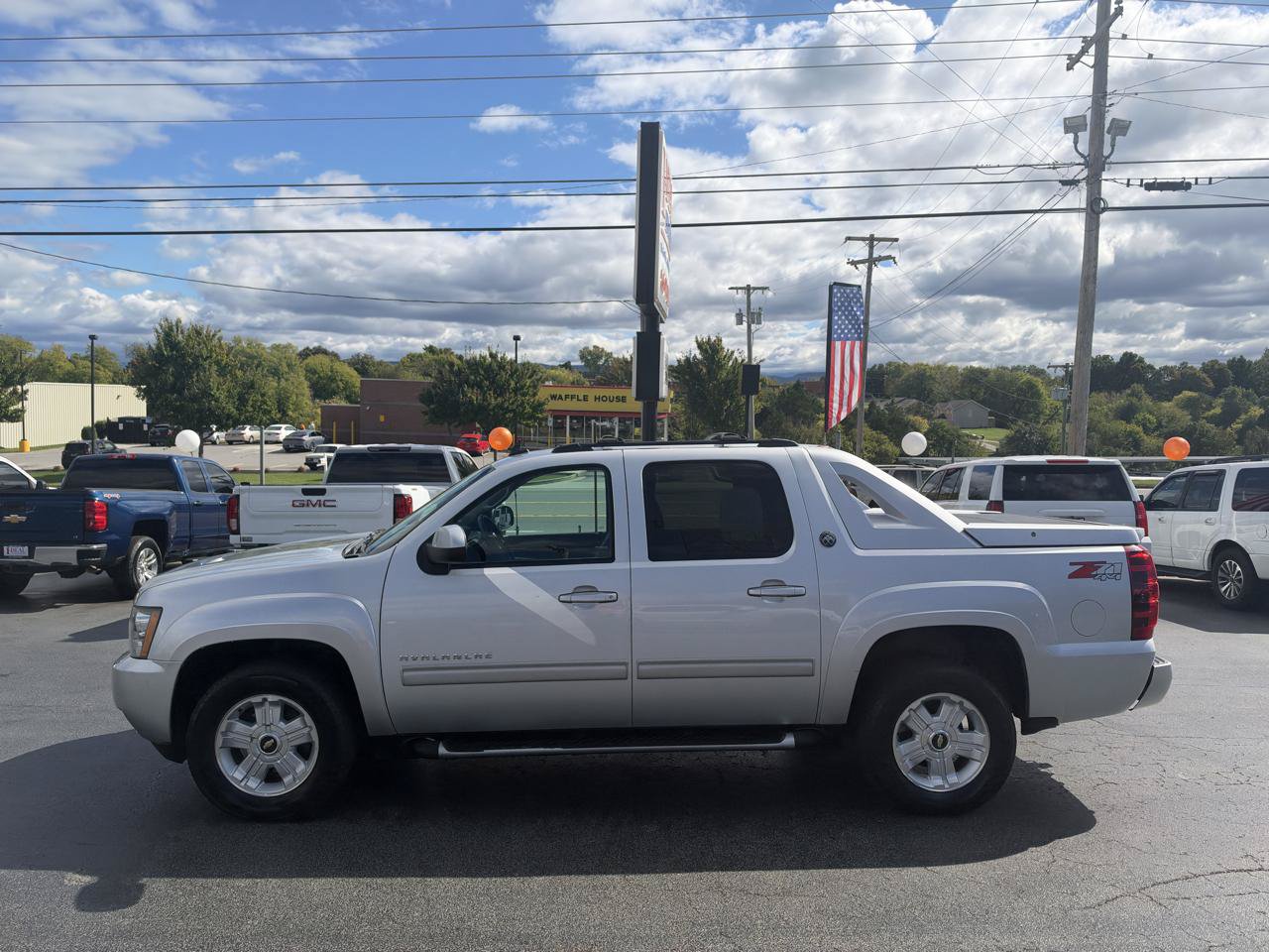 Used 2013 Chevrolet Avalanche LT w/ Suspension Package, Off-Road AWD/4WD image 1