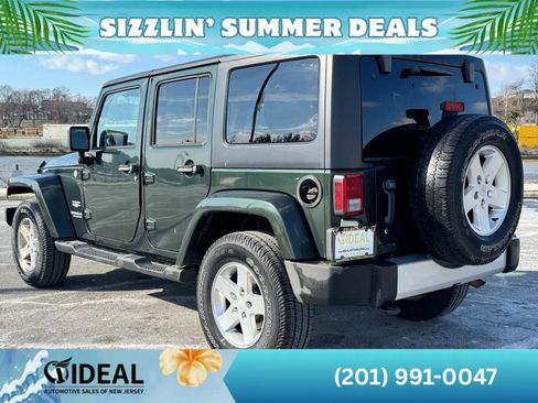 Used 2011 Jeep Wrangler Unlimited Sahara w/ Dual Top Group AWD/4WD image 4