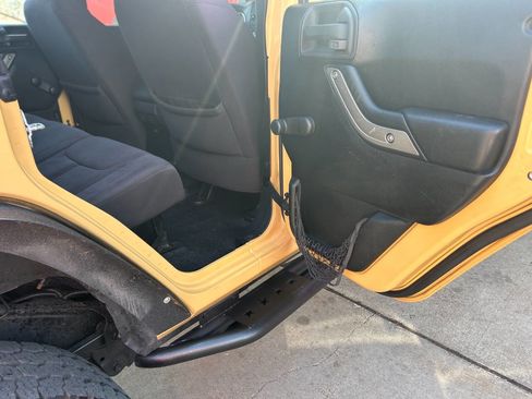 Used 2013 Jeep Wrangler Unlimited Sport w/ Mopar Black Appearance Group image 23