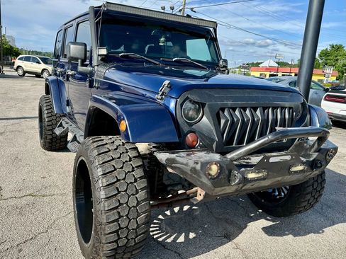 Used 2013 Jeep Wrangler Unlimited Sahara w/ Connectivity Group AWD/4WD image 1