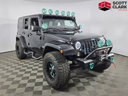 Used 2015 Jeep Wrangler Unlimited Sahara w/ Max Tow Package image 1