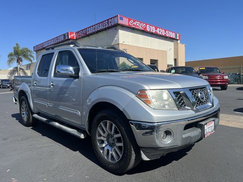Used 2011 Nissan Frontier SL RWD image 1