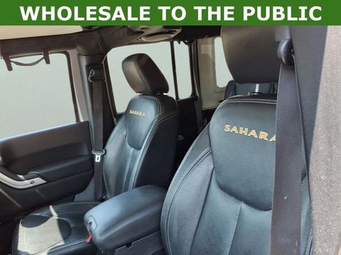 Used 2013 Jeep Wrangler Unlimited Sahara w/ Dual Top Group AWD/4WD image 11