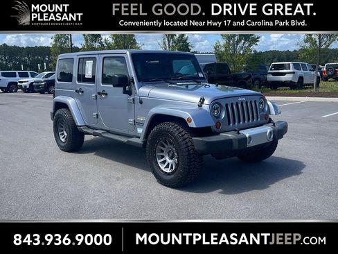 Used 2013 Jeep Wrangler Unlimited Sahara w/ Connectivity Group AWD/4WD image 1