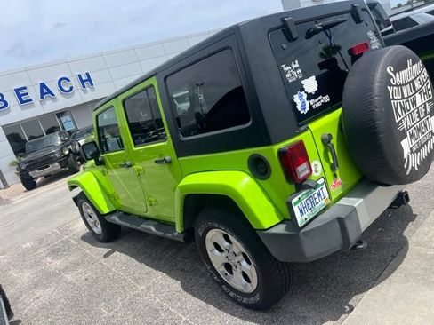 Used 2013 Jeep Wrangler Unlimited Sahara w/ Dual Top Group AWD/4WD image 6