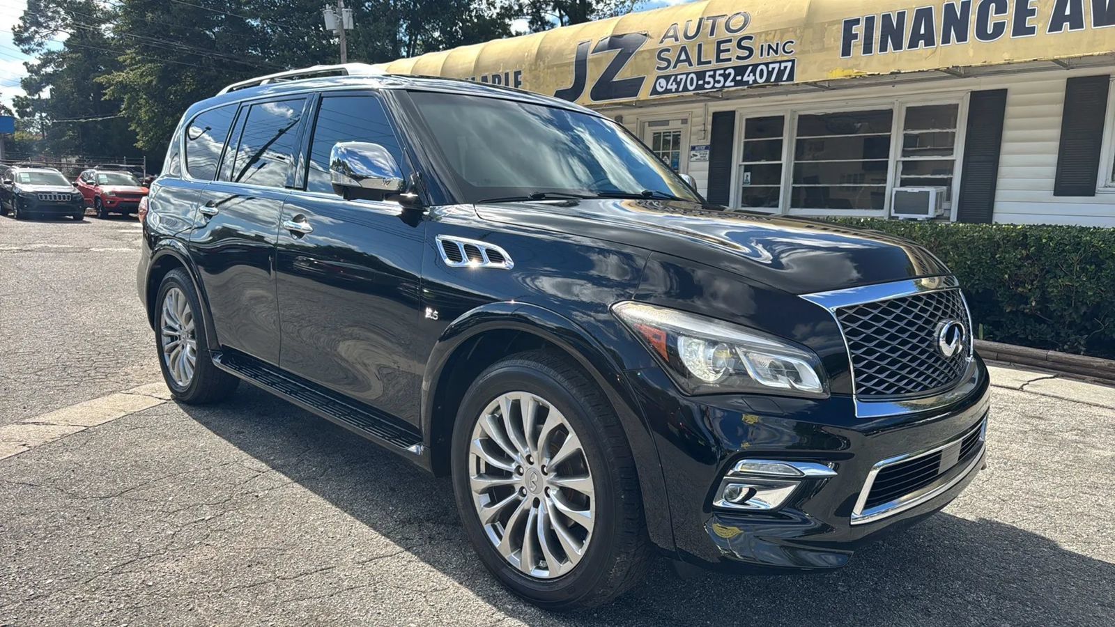 Used 2016 INFINITI QX80 4WD w/ Deluxe Technology Package image 1
