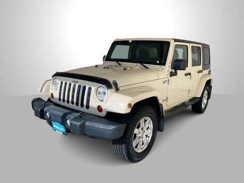 Used 2011 Jeep Wrangler Unlimited Sahara w/ Dual Top Group AWD/4WD image 1