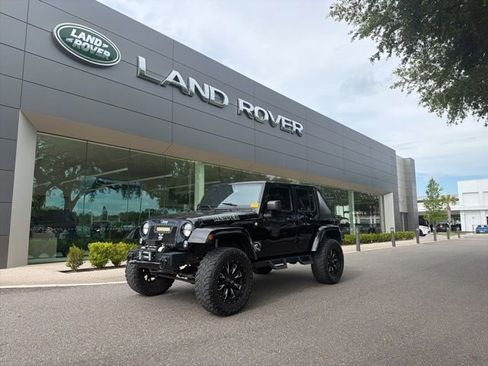 Used 2015 Jeep Wrangler Unlimited Sahara w/ Dual Top Group AWD/4WD image 1