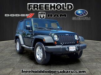 Used 2011 Jeep Wrangler Sport AWD/4WD video 1