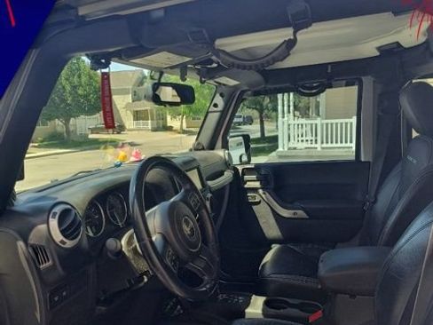 Used 2014 Jeep Wrangler Unlimited Rubicon w/ Dual Top Group AWD/4WD image 6