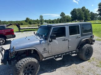 Used 2013 Jeep Wrangler Unlimited Sport AWD/4WD video 1