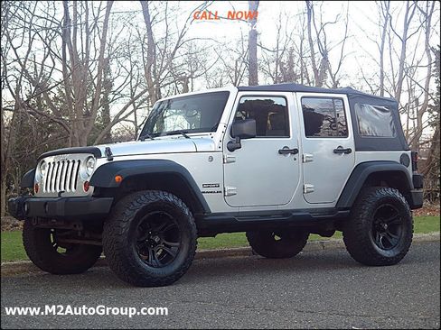 Used 2010 Jeep Wrangler Unlimited Sport image 1