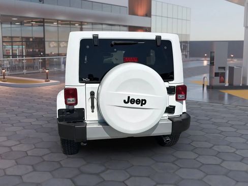 Used 2015 Jeep Wrangler Unlimited Sahara w/ Mopar Chrome Edition Group AWD/4WD image 11