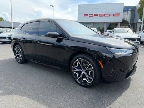 Used 2024 BMW iX xDrive50 w/ Premium Package AWD/4WD image 1