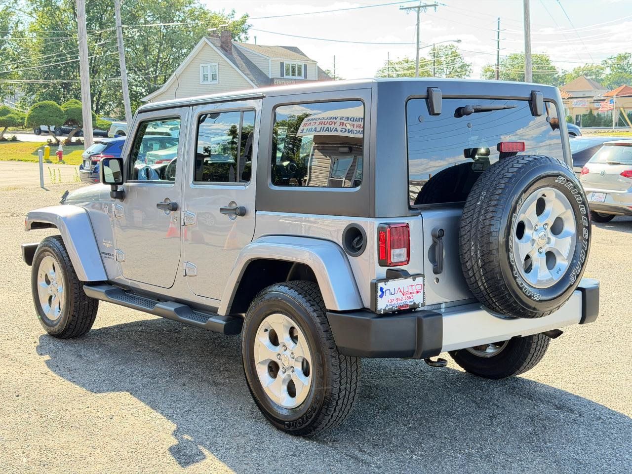 Used 2015 Jeep Wrangler Unlimited Sahara w/ Dual Top Group AWD/4WD image 6
