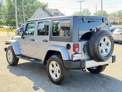Used 2015 Jeep Wrangler Unlimited Sahara w/ Dual Top Group AWD/4WD image 6