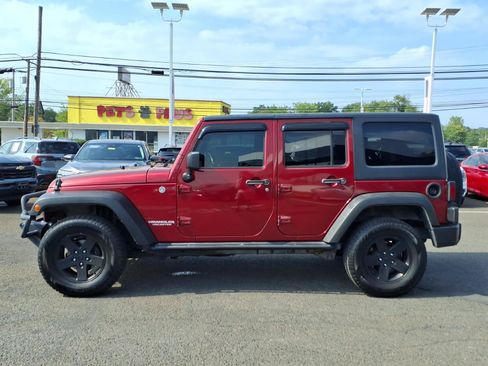 Used 2012 Jeep Wrangler Unlimited Sport AWD/4WD image 7
