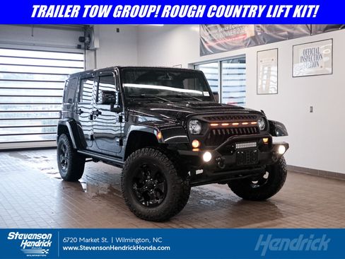 Used 2015 Jeep Wrangler Unlimited Sahara AWD/4WD image 1