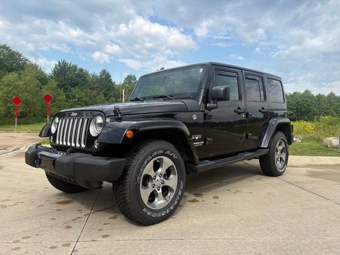 Used 2017 Jeep Wrangler Unlimited Sahara AWD/4WD image 1