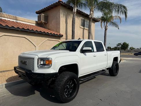 Used 2015 GMC Sierra 1500 SLT w/ SLT Preferred Package AWD/4WD image 1
