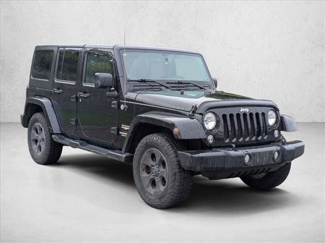 Used 2014 Jeep Wrangler Unlimited Sahara AWD/4WD image 3