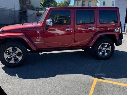 Used 2011 Jeep Wrangler Unlimited Sahara w/ Mopar Chrome Edition Group AWD/4WD image 3