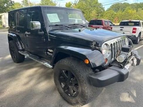 Used 2013 Jeep Wrangler Unlimited Sahara w/ Mopar Chrome Edition Group image 1