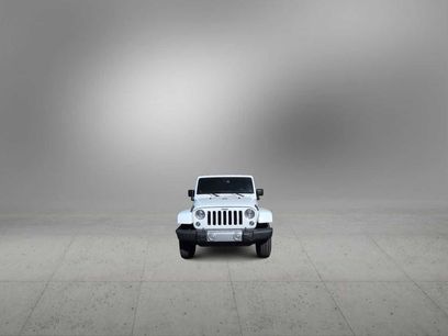 Used 2014 Jeep Wrangler Unlimited Sahara w/ Dual Top Group