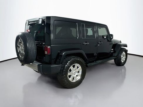 Used 2013 Jeep Wrangler Unlimited Sahara w/ Dual Top Group AWD/4WD image 8